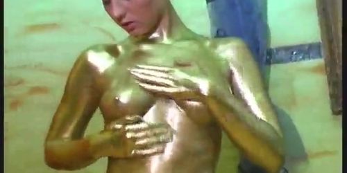 Crazy girl complete painted in gold (clip)