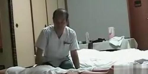 My naked wife gets massage from an Asian man