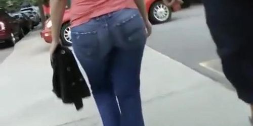 Big ass woman in tight jeans pants walking