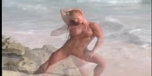 Lean fitness girl on a beach