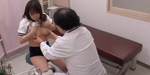 Long haired brunette gets fingered by the gynecologist