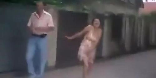 Drunk girl shows off in the evening on the streets