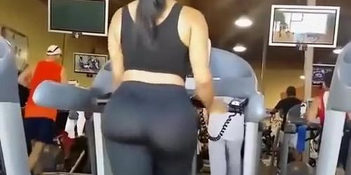 Big ass woman in tight sports pants at gym