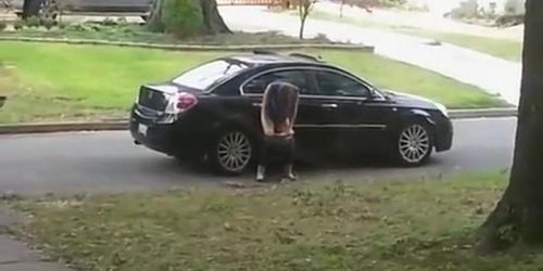 Desperate girl pees on a public suburban street