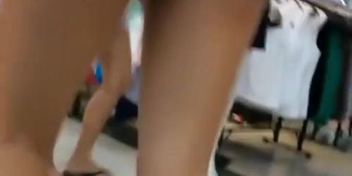 Cute tourist teen in tight shorts cameltoe