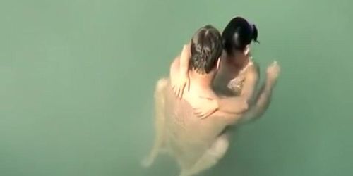 Nudist sex in the water