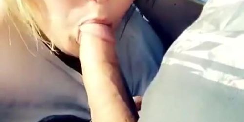 Blonde girl sucks big dick inside car