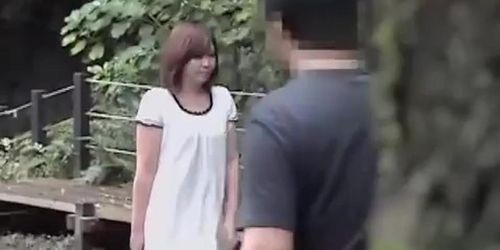 Sharking of a lovely Japanese girl in a public park