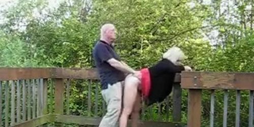 Mature couple fucking in public place