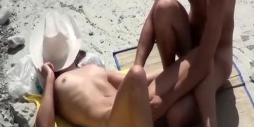 Nude couple fucking in rocky beach