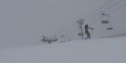 Naked Asian is skiing down the mountain public flash