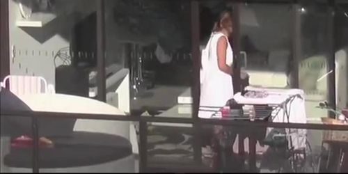Voyeur films asian in her apartment
