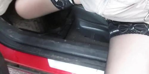 Girl flashing stockings tops while out of the car