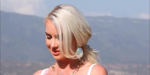 Blonde Gigi Allens is teasing and masturbating under the sun