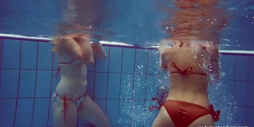 Hottest teens Melisa and Marusia swimming in the pool