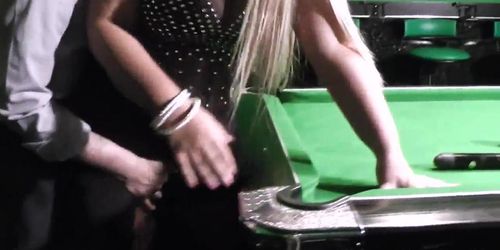 Big boobs blonde spreads her legs on the table