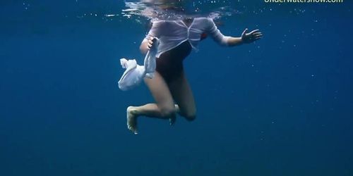 Underwater romantic nude swimming