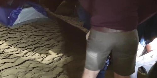 Sucking a stranger's cock on the beach.