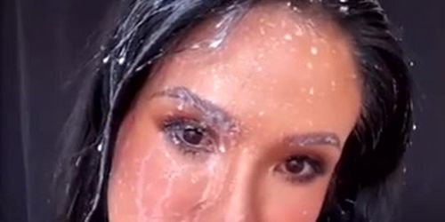 Thai MILF Gettin' Drenched