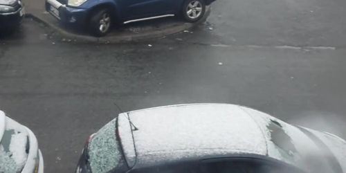 Naked girl has sex in the snow behind the car