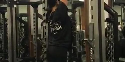 Vanessa White doing pullups at the gym.