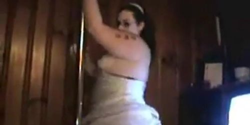 Chubby girl stripping in a white dress