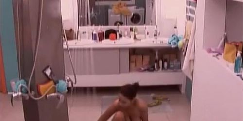 Sexy girl soaps up in a big brother show