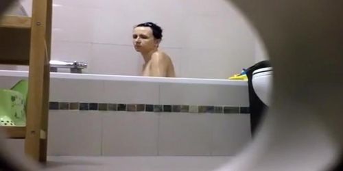 Peeping on her shower through a hole (Hot Lady)