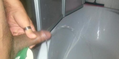 A guy masturbates his little dick on camera
