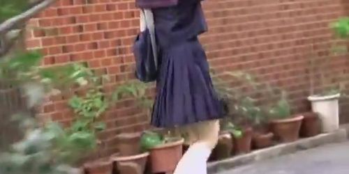 Little schoolgirl loses her skirt when some sharking chap pulls it away