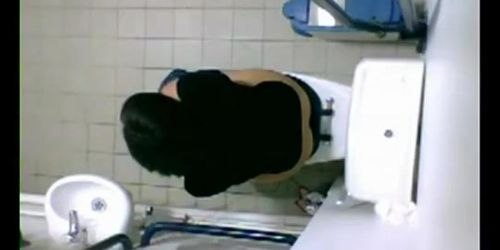 The piss cam records girl on toilet bowl from above