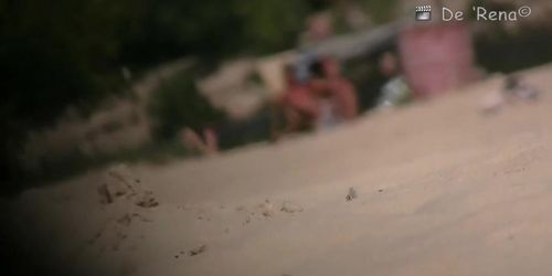 wide open and bending over on the beach with the nudists