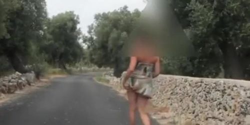 Exhibitionist flashing in the country road