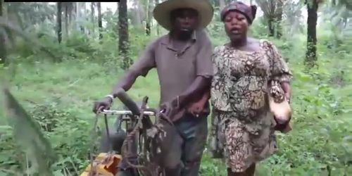 Husband and wife working out in the farm