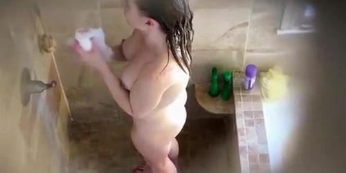 Woman with big rough nipples showering