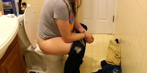 Chubby woman caught peeing in bathroom toilet