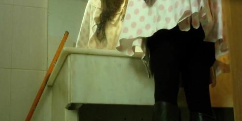 Gorgeous teens filmed pissing in bathroom