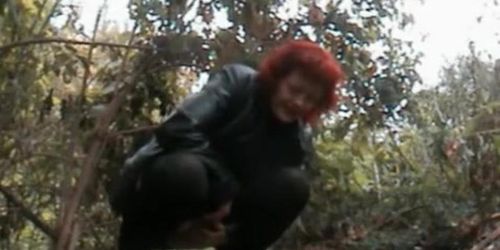 Mature redhead pee in the forest
