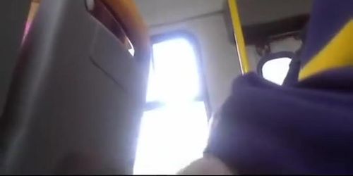 Guy flashes his balls in the bus