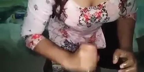 Girl friend giving Handjob to her lover at home