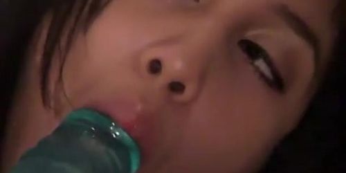 Cute Asian teen uses her huge blue dildo to fuck her wet punani