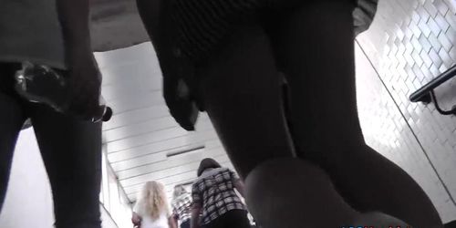 Upskirt public video filmed on the subway stairs