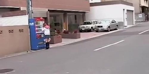 Asian girl in boots skirt sharked while buying soda
