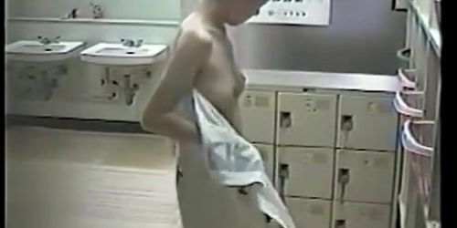 The whole body of amateur is nude on dressing room spy cam
