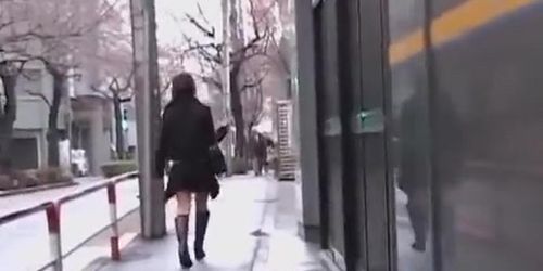 Cute Asian girl gets a skirt sharking on the street.