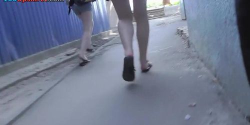 A-line skirt on petite ass of a redhead in upskirt vid