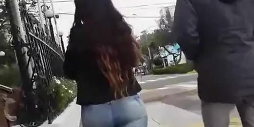 Long hair chick with nice ass wearing tight jeans