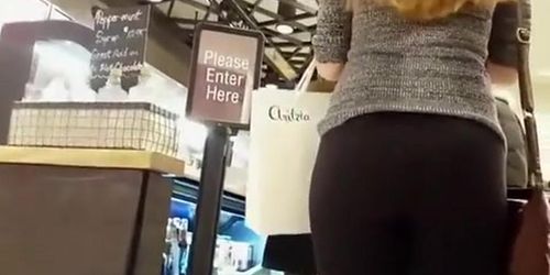 Blonde chick wearing tight black leggings