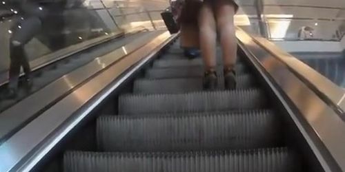 upskirted in the shopping mall rolling stairs