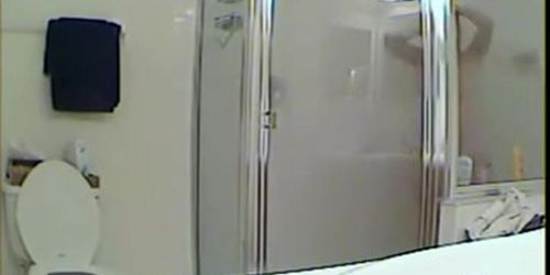 Spy cam shower vid with girl hiding body under towel